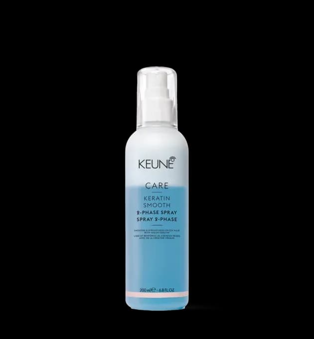 Keune Care Keratin Smooth 2-Phase Spray Vegan 200ml – dual-phase leave-in spray to smooth and strengthen frizzy hair, enriched with keratin for softness and shine, available at Baileys Hairdressing